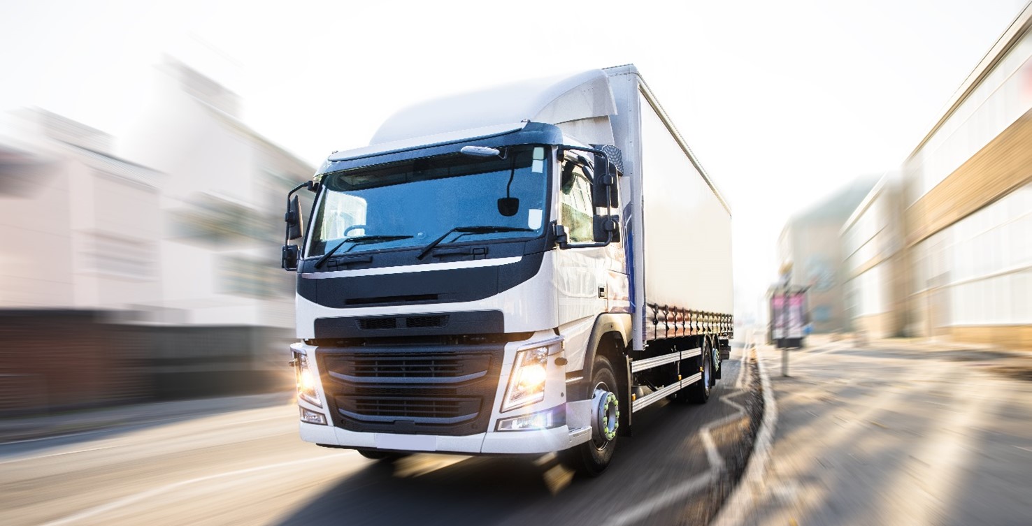 Large commercial trailer vehicle on road