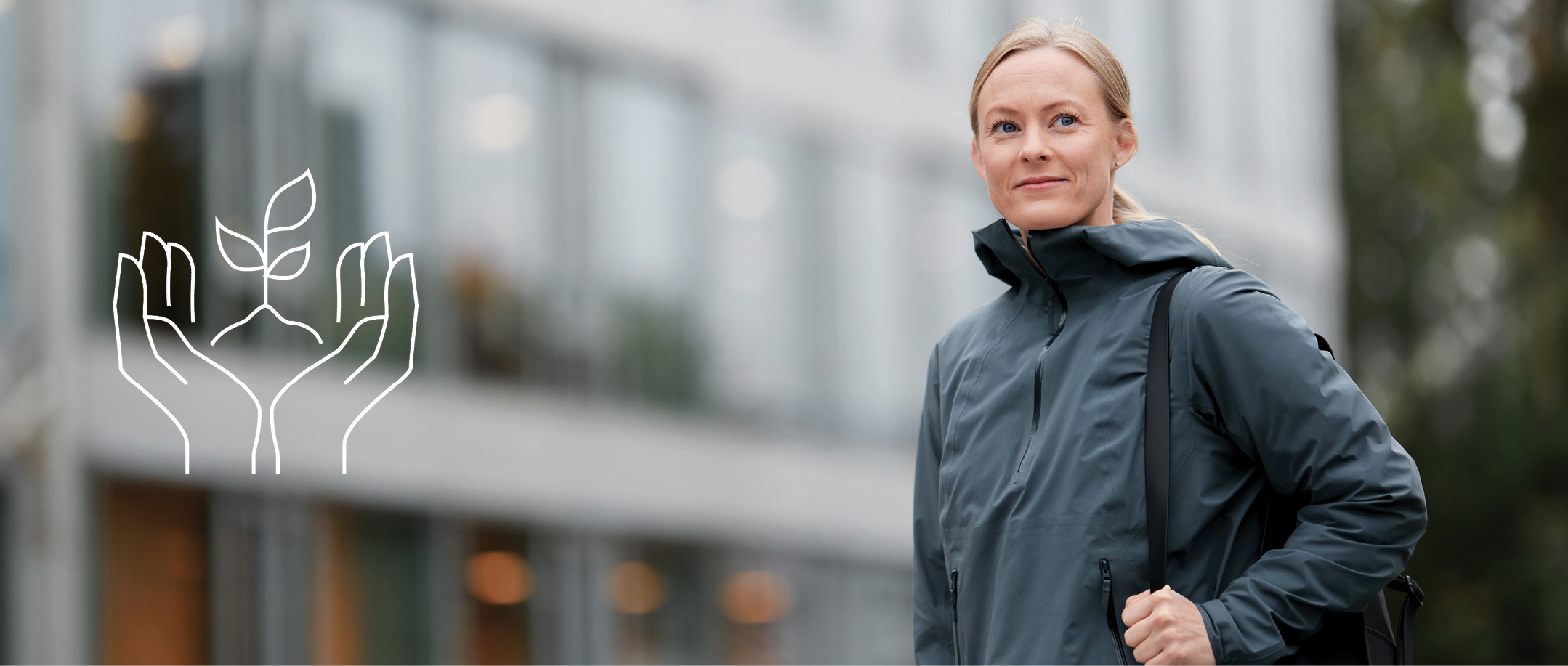 A person walking outside in front of a building 