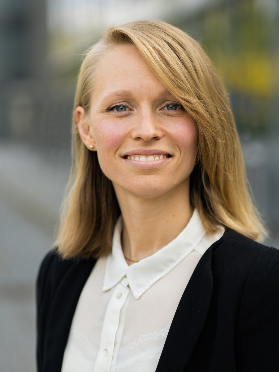 a woman smiling at the camera