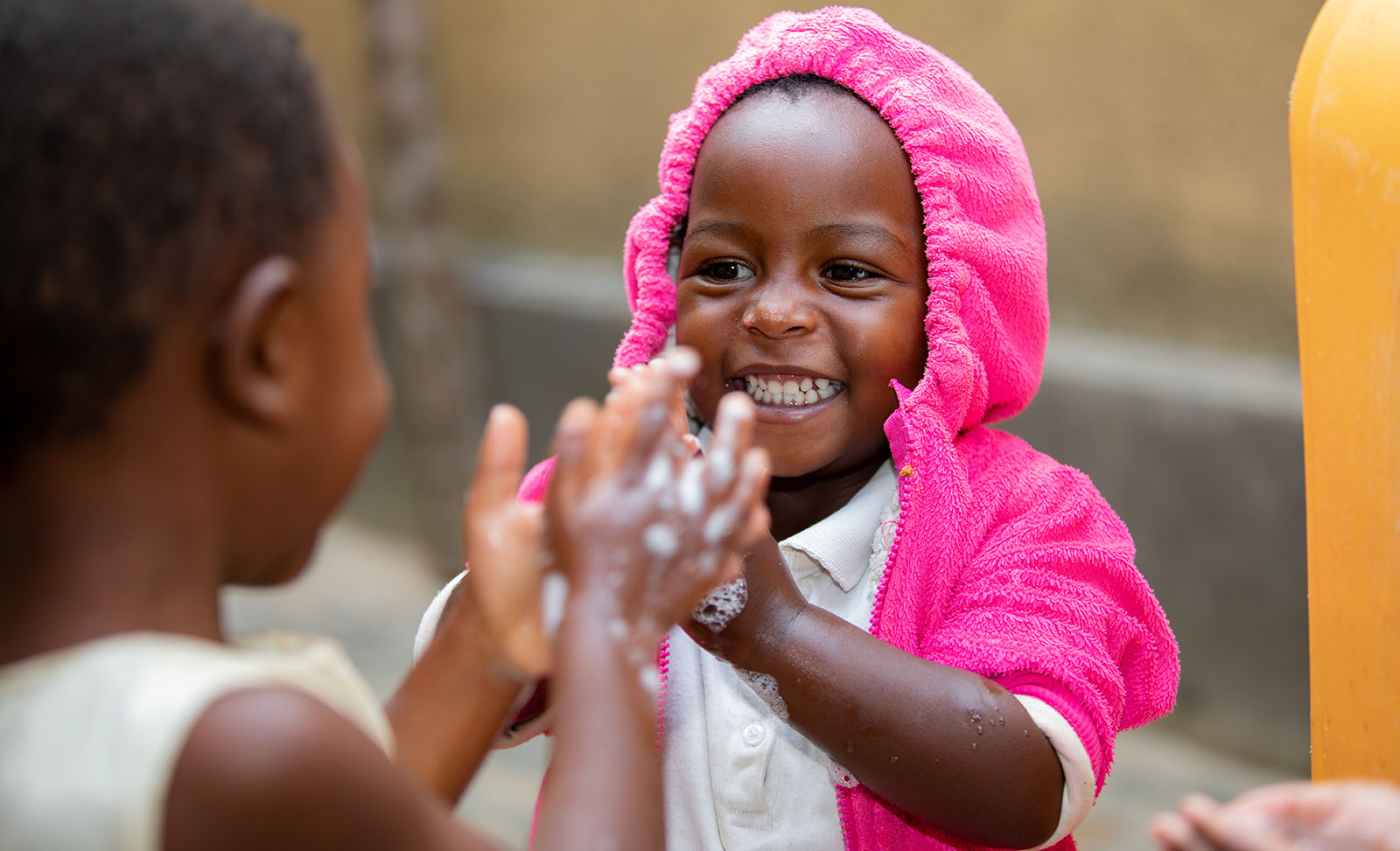 Girl washing hands