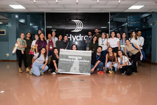 a group of people posing for a photo