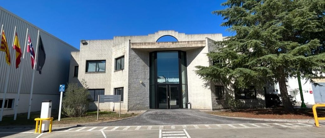 a building with flags in front