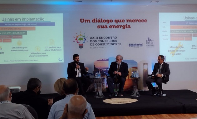 a group of men sitting in chairs