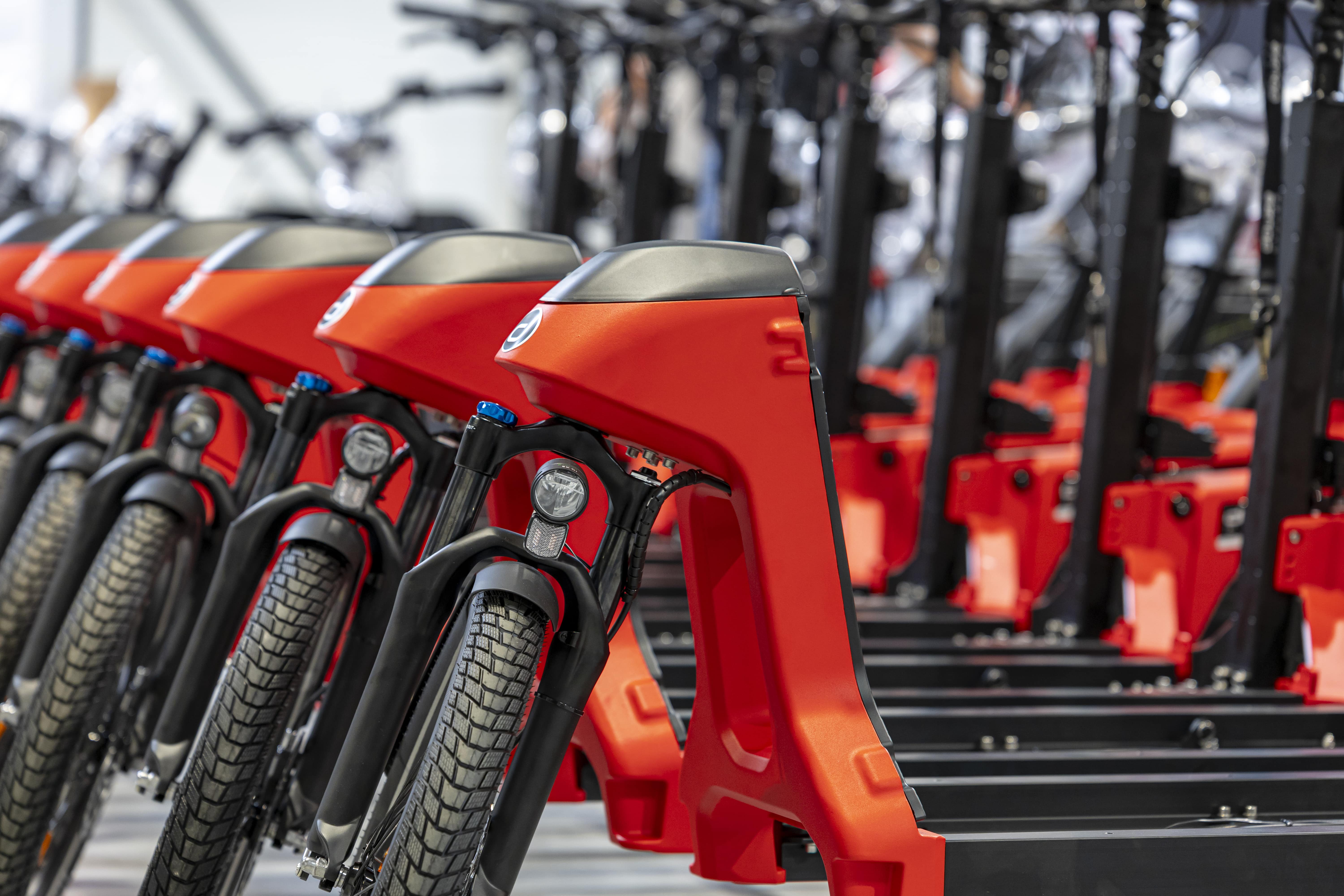 a red motorcycle with a black seat